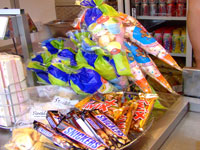 Confectionary including Twix and Snickers chocolate on display